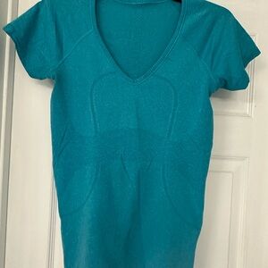 Lululemon - two tops- price is for the two. Teal V-Neck Top and Green tank top